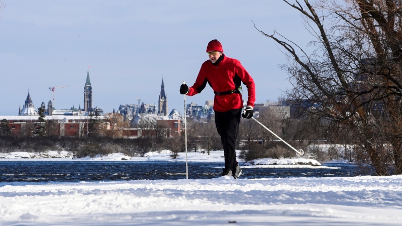 A skier makes his way along the banks of the Ottawa River in Ottawa on Wednesday, Jan. 27, 2021. (Sean Kilpatrick/THE CANADIAN PRESS)
