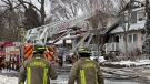 Emergency crews attend the scene of a three-alarm fire that left four people dead. (Christopher Broadley/CTV News Toronto)