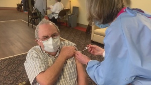 Residents at Chartwell Whispering Pines Retirement Centre in Barrie, Ont., receive their first dose of the COVID-19 vaccine on Fri., Jan. 29, 2021 (Madison Erhardt/CTV News)