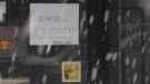 A closed sign is seen in the window of a London, Ont. business on Friday, Jan. 29, 2021. (Daryl Newcombe / CTV News)