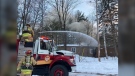 Firefighters battle a fire at the MacSkimming Outdoor Education Centre on Hwy. 171. (Photo courtesy: Twitter/OttFire)