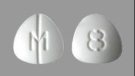 The pills were a white triangle shape with “M” scored on one side and “8” scored on the other
