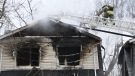 Firefighters work to put out a house fire in Toronto, Friday, Jan.29, 2021. Fire ripped through an east-end Toronto home early Friday killing four people and injuring several others. THE CANADIAN PRESS/Frank Gunn