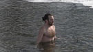 Jarryd Lee takes a dip in the Rideau River on a cold January day. (Dylan Dyson/CTV News Ottawa)
