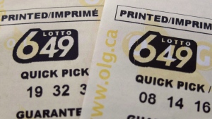 A pair of Lotto 649 tickets are pictured in Toronto on October 17, 2015. THE CANADIAN PRESS/Richard Plume