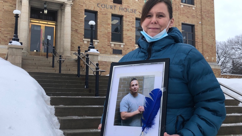Carla Peterson holds a picture of her son Duane Brett Ledoux. (Lisa Risom/CTV Prince Albert)
