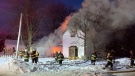 Firefighters work to contain a house fire in Brussels Ont. on Tuesday, Feb. 2, 2021. (Source: Kevin Bernard)