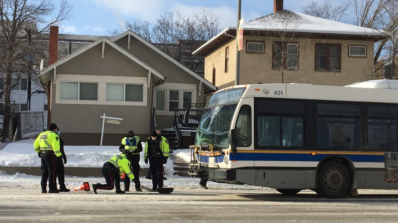 Police investigate a collision between a bus and a pedestrian that occurred on Broad St. on Feb. 3, 2021. (Katy Syrota/CTV News)