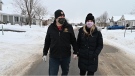 Ottawa firefighter Derek Bowker walking with his wife Jennifer Eberts. (Joel Haslam/CTV News Ottawa)