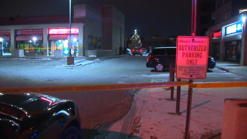 Toronto police investigate a shooting in a parking lot in the area of Sheppard Avenue East and Gateforth Drive in Scarborough Saturday, February 6, 2021.