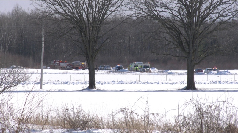 Emergency crews are stationed at the west end of runway 2-8 of the Carp Airport. Feb. 10, 2021. (Tyler Fleming/CTV News Ottawa)


