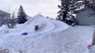 The Town of Okotoks has apologized for taking down a toboggan hill that a family built in their front yard