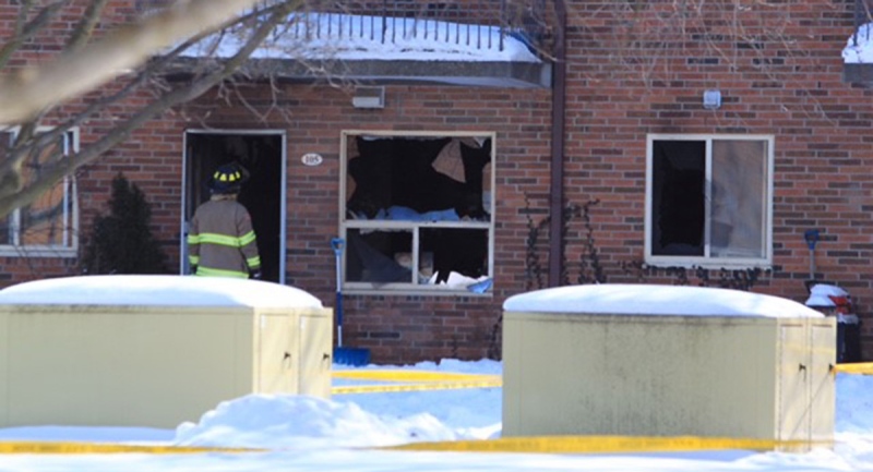 Firefighters work at the scene of a fire in Mitchell, Ont. on Thursday, Feb.11, 2021. (Gerry Dewan / CTV News)