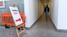 A man leaves a COVID-19 assessment centre at the Wellfort Community Health Services facility in Mississauga, Ont., on Tuesday, February 9, 2021. THE CANADIAN PRESS/Nathan Denette