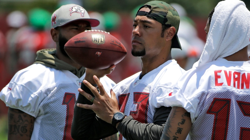 In this June 14, 2016, file photo, Tampa Bay Buccaneers wide receiver Vincent Jackson (83) attends drills at an NFL football minicamp in Tampa, Fla. Florida authorities are looking into the death of former Buccaneers player Jackson, who was found dead Monday, Feb. 15, 2021, at a Florida hotel room. (AP Photo/Chris O'Meara, File)