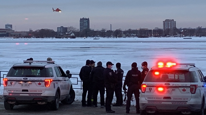Police on scene at the Detroit River after reports that a man may have fallen in the river in Windsor, Ont. on Wednesday, Feb. 17, 2021. (Chris Campbell/CTV Windsor)