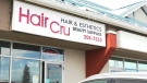 A Calgary salon owner says he was set up by Alberta Health Services, resulting in a fine he wants rescinded.
