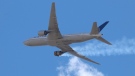 United Airlines Flight 328 approaches Denver International Airport after experiencing a 'right engine failure' shortly after taking off from Denver on Feb. 20, 2021.
