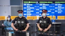 Police and workers wait for arrivals at the COVID-19 testing centre in Terminal 3 at Pearson Airport in Toronto on Wednesday, February 3, 2021. THE CANADIAN PRESS/Frank Gunn