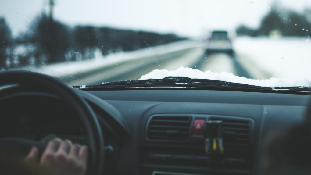 Car driving on snowy road