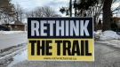 'Rethink the trail' sign in the front yard of a home on Riverside Drive East in Tecumseh, Ont. on Tuesday, Feb. 23, 2021. (Stefanie Masotti/CTV Windsor)