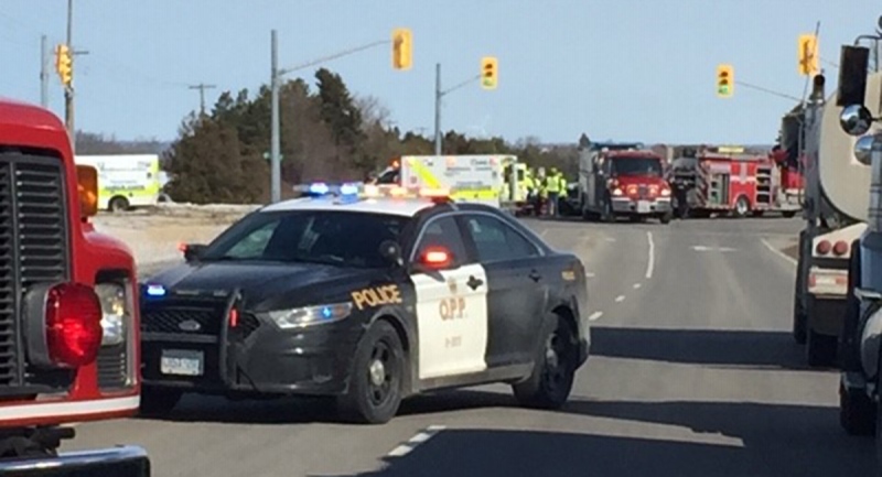 Emergency crews work a the scene of a collision north of Strathroy, Ont. on Wednesday, Feb. 24, 2021. (Marek Sutherland / CTV News)