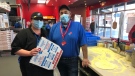Mike Diab and Domino's general manager Brandy Vanevery during the 'Talking Over Pizza' fundraiser in in Leamington, Ont. on Saturday, Feb. 27, 2021. (Alana Hadadean/CTV Windsor)