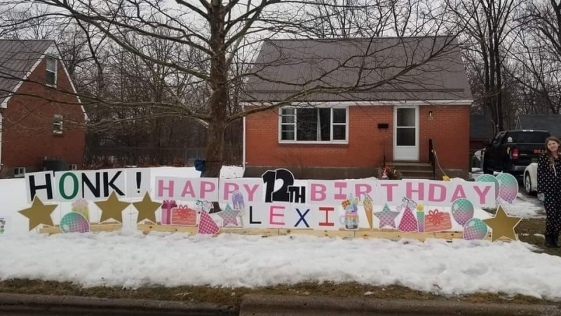 Birthday signage for Lexi's 12th birthday outside of her home in St. Thomas (Jordyn Read / CTV News)