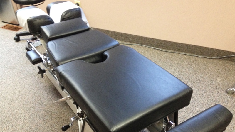 A chiropractor's table is seen in this undated file photo. 