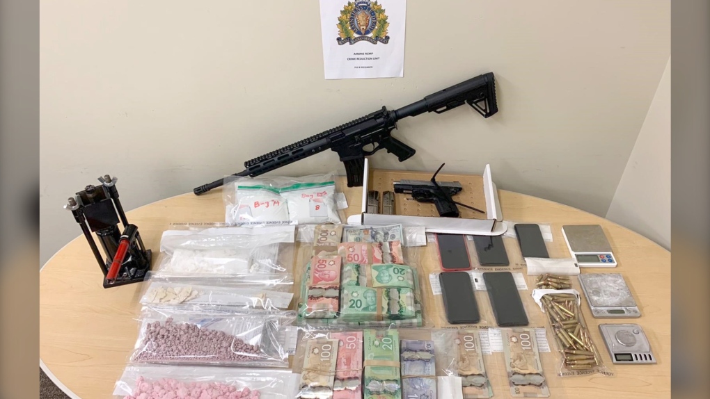 Airdrie weapons drugs seized RCMP