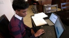 Rishi Naidu, a Grade 11 student at Vincent Massey Secondary, studies at his Windsor home on March 1, 2021. (Rich Garton / CTV Windsor)