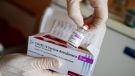 A package of the AstraZeneca COVID-19 vaccine is shown in the state of Brandenburg where the first coronavirus vaccinations are given in doctors' surgeries, in Senftenberg, Germany, Wednesday, March 3, 2021. (Hannibal Hanschke/Pool via AP)