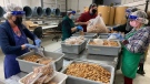 Volunteers at The Southwestern Ontario Gleaners package dehydrated food for the hungry in Leamington, Ont. on Wednesday, March. 3, 2021. (Chris Campbell/CTV Windsor)