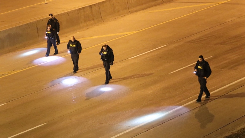OPP on scene of a shots fired incident on Highway 401 in Windsor, Ont. on Monday, March 8, 2021. (courtesy OnLocation)