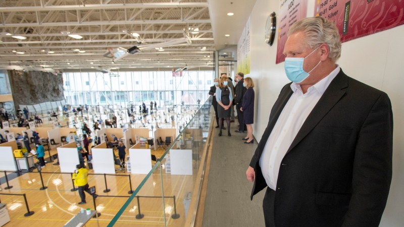 Ontario Premier Doug Ford tours a COVID-19 mass vaccination clinic in Toronto on Monday, March 8, 2021. THE CANADIAN PRESS/Frank Gunn