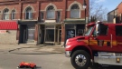 Fire crews on scene of a downtown apartment fire in West Lorne on Wednesday, March 10, 2021. (Sean Irvine / CTV London)