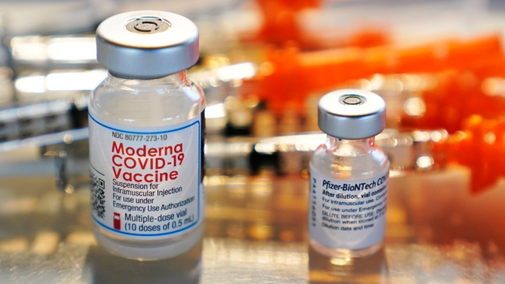 Vials of Moderna and Pfizer COVID-19 vaccines