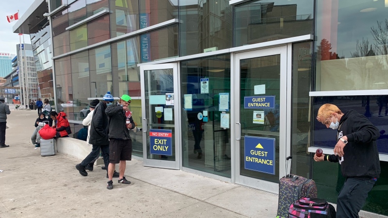 People waiting outside the Windsor International Aquatic Training Centre to receive a rapid COVID test in Windsor, Ont. on Wednesday, Mar. 10, 2021. (Chris Campbell/CTV Windsor)