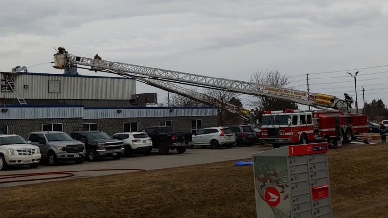 Leamington firefighters battle a fire at a commercial building in Leamington, Ont., on Thursday, March 11, 2021. (Courtesy Fire Chief Andrew Baird / Twitter)