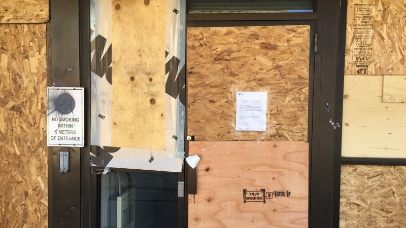 The Intercommunity Health Centre in London, Ont. is boarded up after it was vandalized, Friday, March 12, 2021. (Bryan Bicknell / CTV News)
