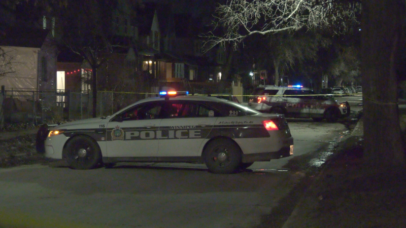 Members of the Winnipeg Police Service could be seen on Agnes Street on Friday, March 12, 2021. (Glenn Pismenny/CTV News)