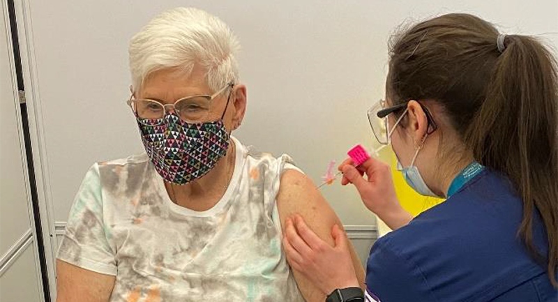 Marion Gillespie of Innerkip, Ont. receives her first-dose of the Pfizer-BioNTech COVID-19 vaccination in Woodstock, Ont. on Monday, March 15, 2021. She was the first to be vaccinated at that clinic location. (Source: Southwestern Public Health)
