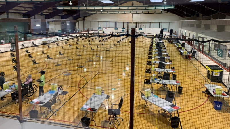 Final preparations are underway at the vaccination clinic at the North London Optimist Community Centre in London, Ont. on Wednesday, March 17, 2021. (Reta Ismail / CTV News)