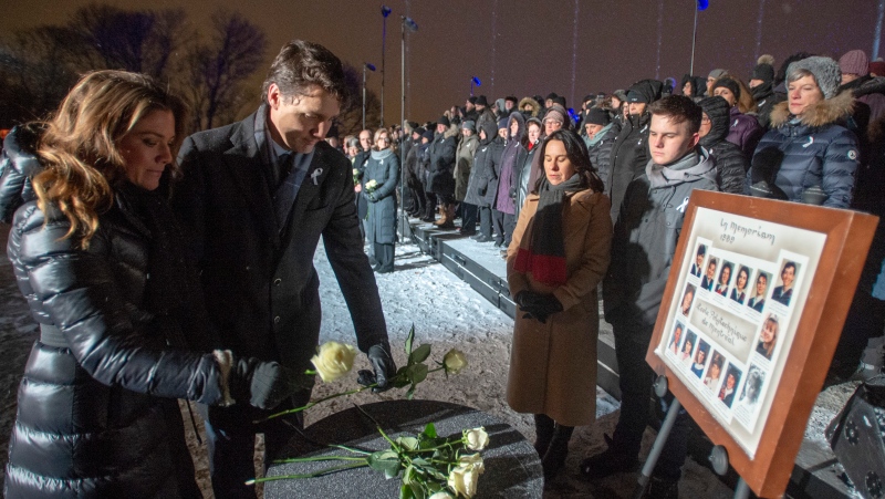 Prime Minister Justin Trudeau and his wife, Sophie Gregoire, place roses during ceremonies to mark the 30th anniversary of the 1989 Ecole Polytechnique attack, where a lone gunman killed 14 female students, Friday, December 6, 2019 in Montreal. Trudeau may not be welcomed back after opponents denounced his gun control bill. THE CANADIAN PRESS/Ryan Remiorz