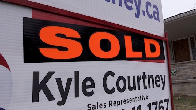 House sale sign in Exeter Ont, seen on Sunday March 21, 2021 (Scott Miller/CTV News)