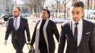 Aissatou Diallo, middle, approaches the courthouse in Ottawa as the criminal trial for the fatal bus crash at the Westboro bus station begins March 22, 2021. Diallo, 44, was charged in August 2019 with three counts of dangerous driving causing death, and 35 counts of dangerous driving causing bodily harm.