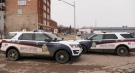 Saskatoon police on scene at the 200 block of Avenue D North on March 23, 2021.