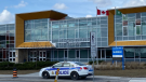 Ottawa Police outside Paul Desmarais Catholic High School in Stittsville responding to a call for a person nearby possibly carrying a gun on Thursday, March 25, 2021. 