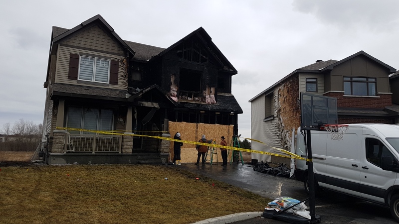 A home on Nordmann Fir Court in Stittsville was severely damaged by a fire that broke out late at night March 26, 2021. (Mike Mersereau / CTV News Ottawa)