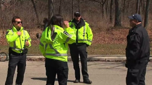 City of Toronto bylaw officers are seen in Woodbine Park on April 10, 2020. (CP24)